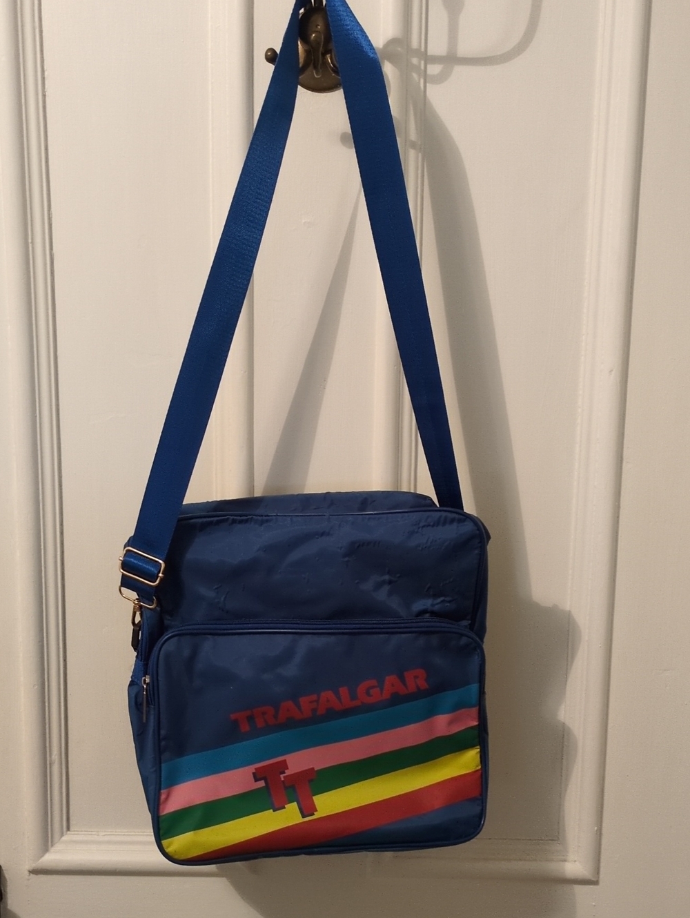 Trafalgar Royal Blue Messenger Bag with Multicolor Stripe Accent